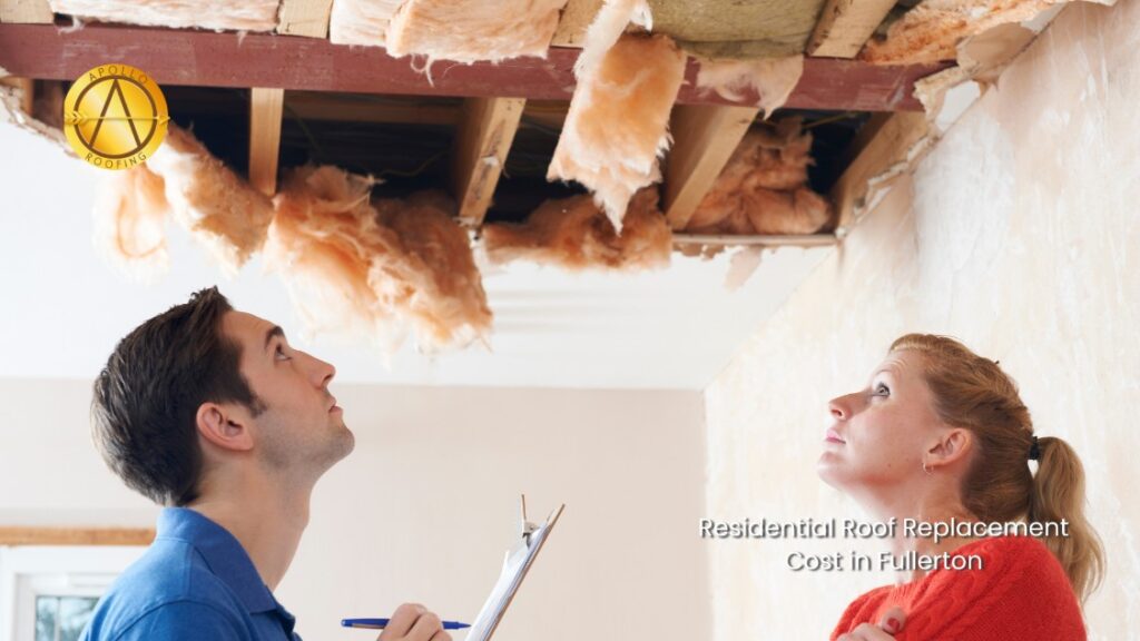 A man and woman look up at a ceiling with exposed beams and hanging insulation, indicating roof damage in Fullerton. The man holds a clipboard and pen. Text reads: Avoid Insurance Mistakes—Residential Roof Replacement Cost in Fullerton.